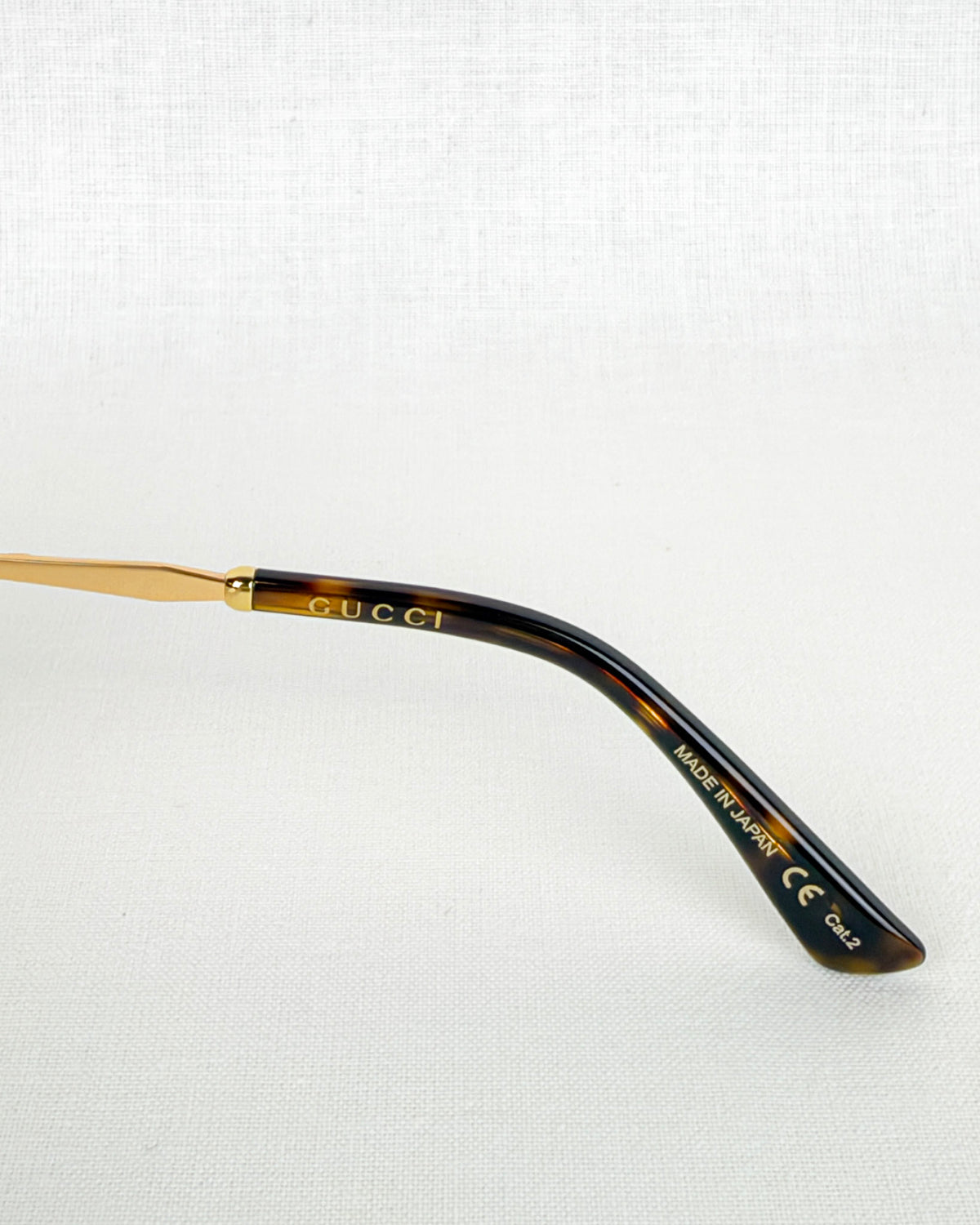 Gucci GG0595S Gold Metal Round Sunglasses