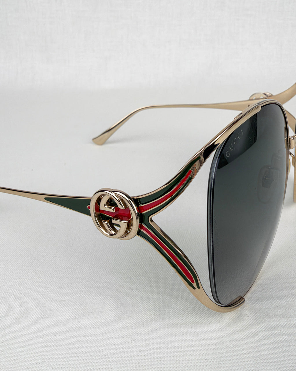 Gucci GG0225S Gold Metal Sunglasses – Gray Gradient